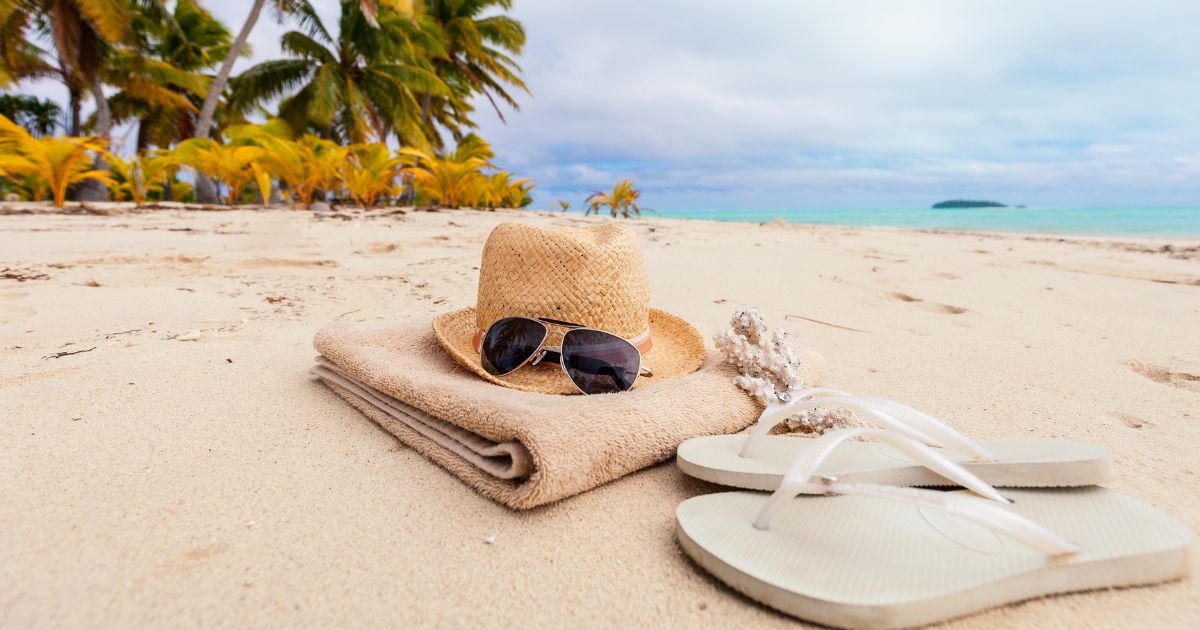 Beach essentials on a sandy beach